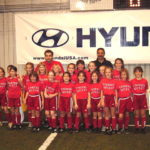 Tony DiCicco with the Academy girls