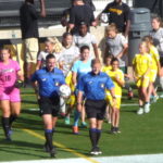 Oct. 6, 2017 KSU vs Jacksonville game: NTH Academy Girls players escort the Owls and Dolphins players during the pre-game walk-out.