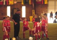 Tony DiCicco with the Academy girls
